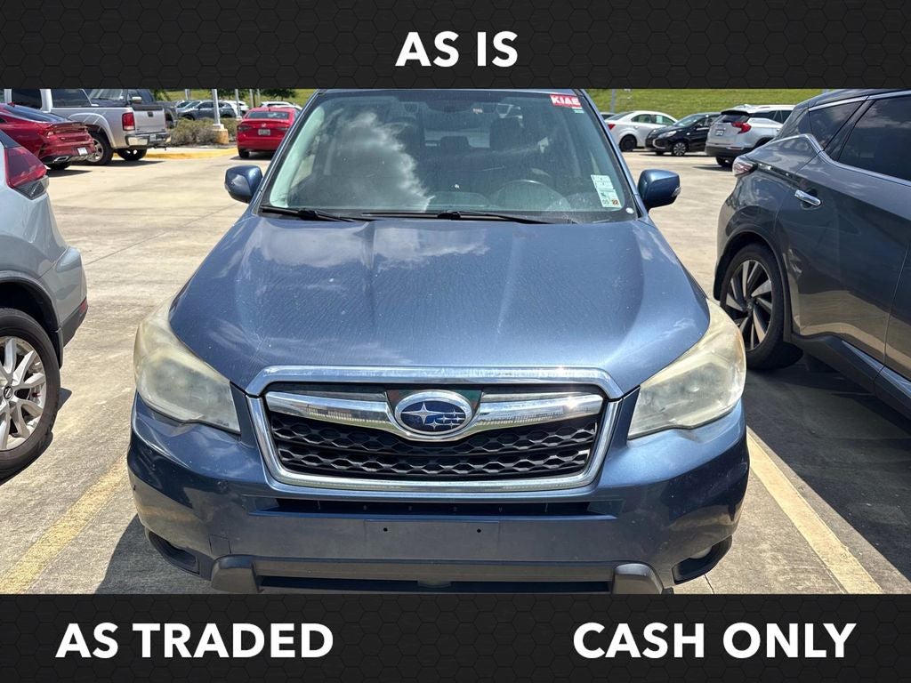 2014 Subaru Forester 2.5i Touring in Marine Blue Pearl — front three-quarter view