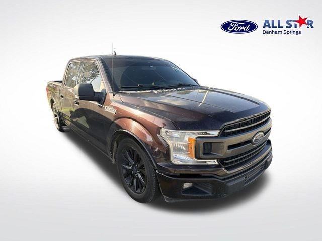 2019 Ford F-150 XLT in Magma Red — front three-quarter view